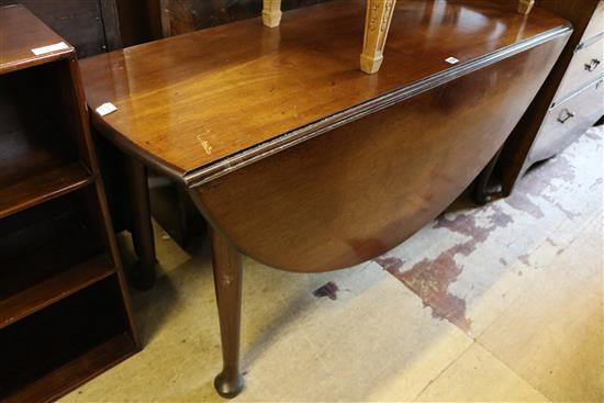 Late George III mahogany drop flap oval dining table